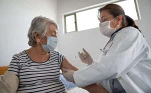 Older woman receiving vaccination